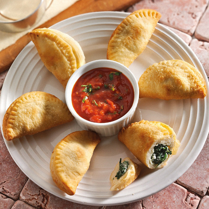 Frittierte mini Calzone mit Ricotta-Spinat-Füllung